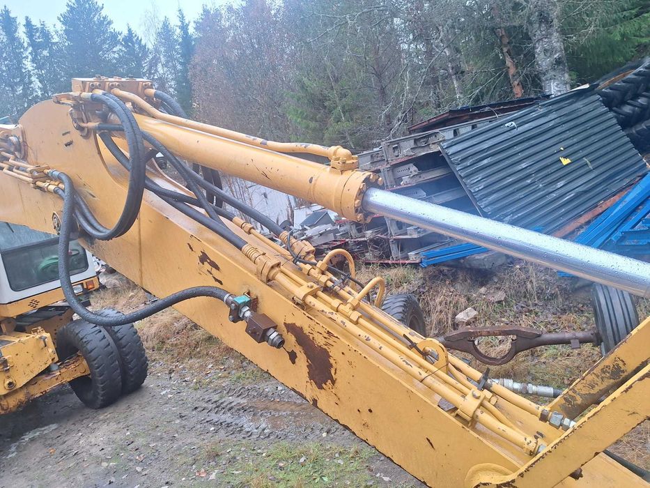 Koparka kołowa Liebherr 312 + rototil