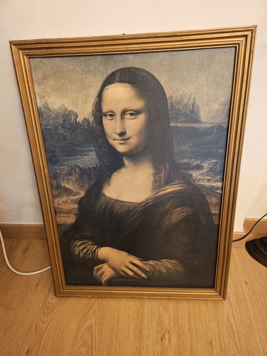 Gioconda com moldura dourada