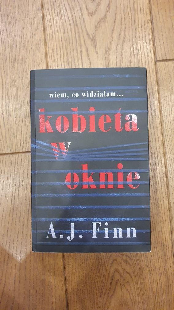 A. J. Find "Kobieta w oknie"