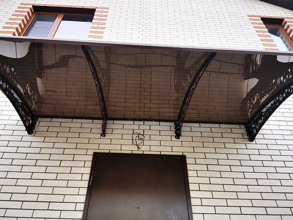 Навіс полікарбонатний захист дизайн двері вікна