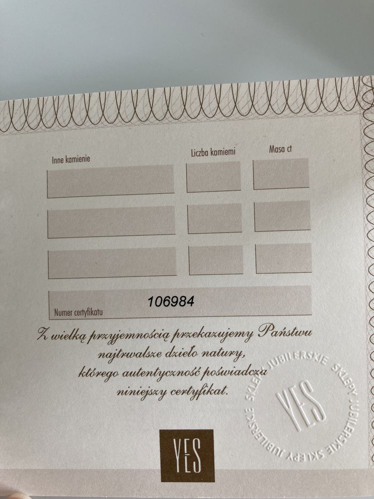 Pierścionek złoty z brylantem