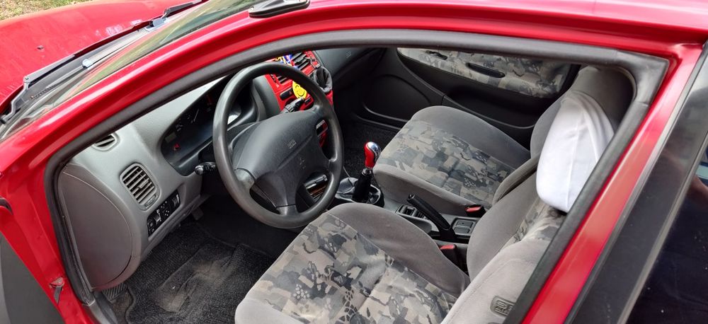 Mitsubishi Carisma 1.8

GDI