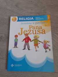 Książka do religii " Jesteśmy w rodzinie Pana Jezusa " klasa 1