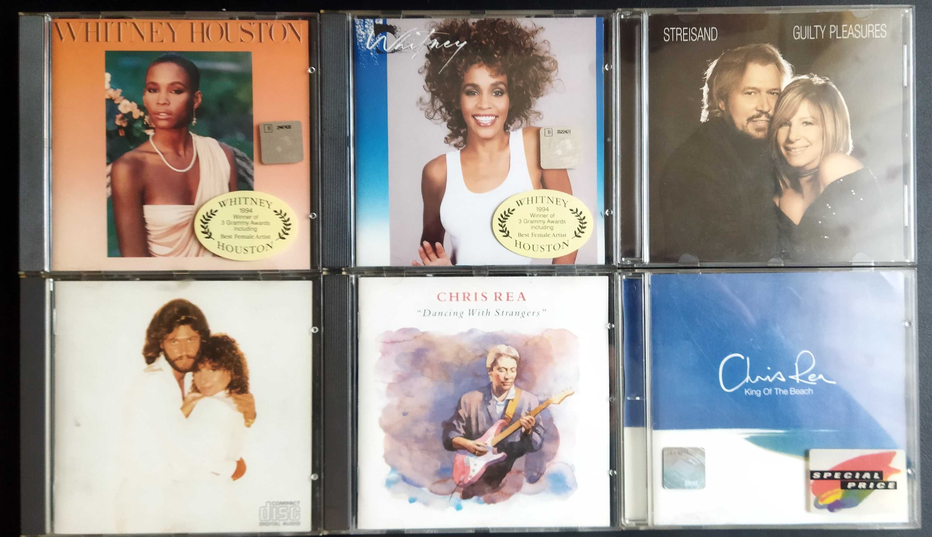 Płyty CD - Whitney Houston i Barbry Streisand.