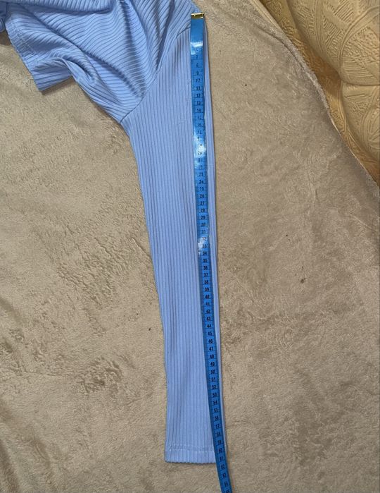 Костюм блакитний юбка з розрізом і топ