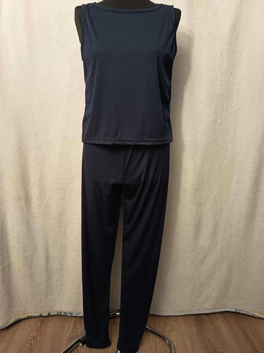 Prążkowany komplet na siłownie/ do spania
XL / 42 / 14·Bardzo dobry