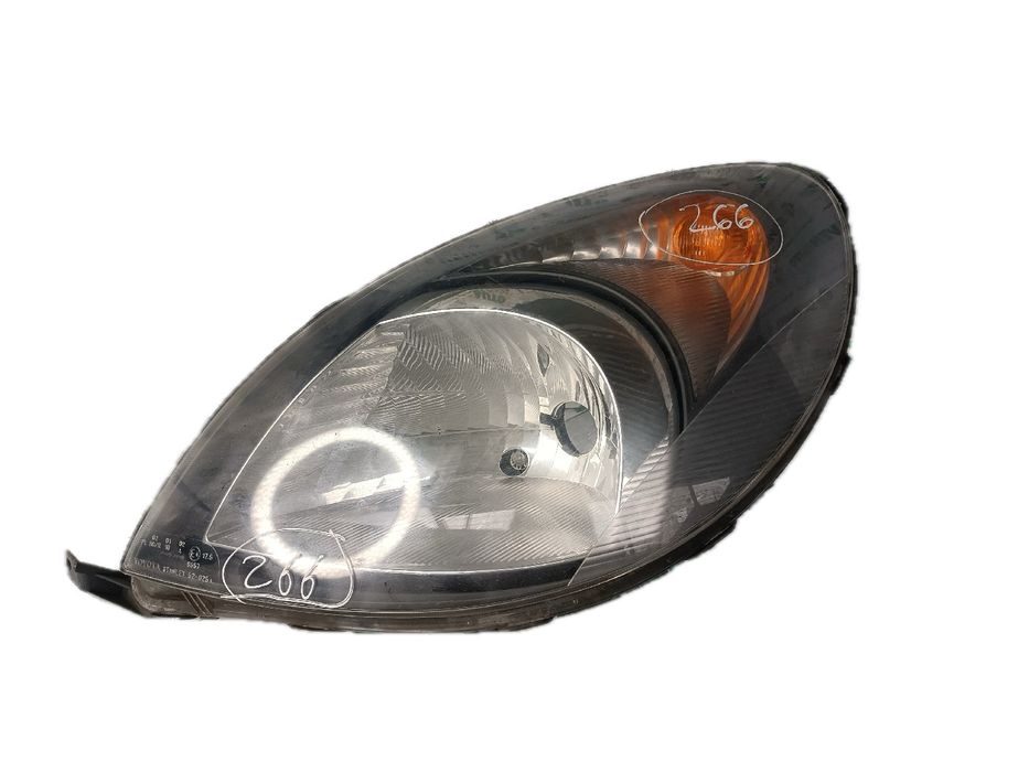 Ótica / farol esquerda TOYOTA Yaris (_P1_)