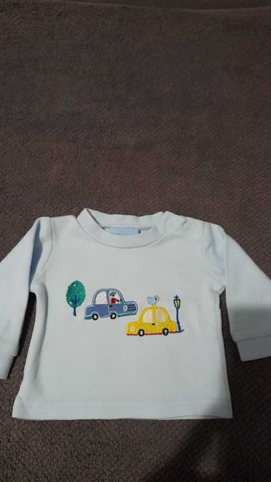 Bluzka roz52 błękitna w auta