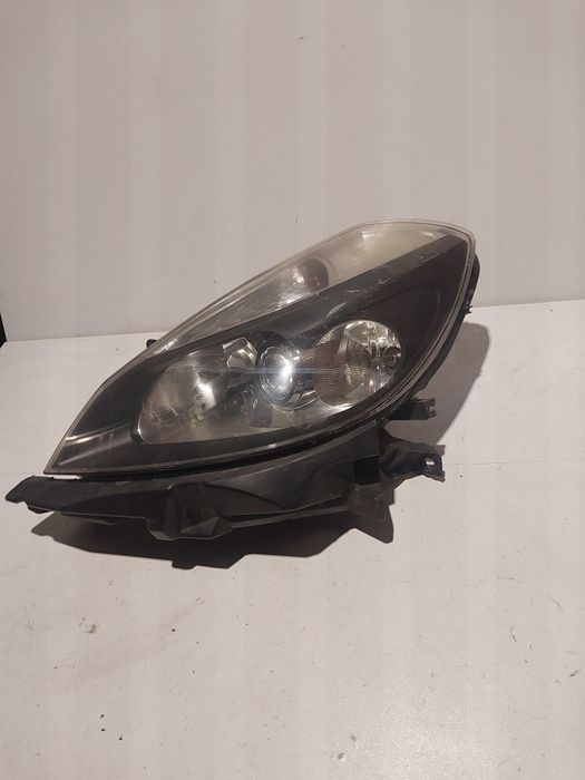 Renault clio III 3 lewa lampa przednia przód reflektor lewy soczewka