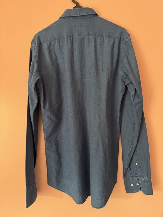 Camisa azul Decenio