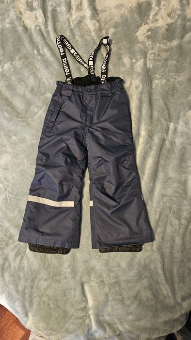 Spodnie zimowe dziecięce Reima rozmiarze 104 jak nowe.