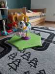 skoczek zebra fisher price