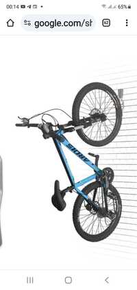 Настенный держатель для велосипеда за колесо . Хранение велосипеда.