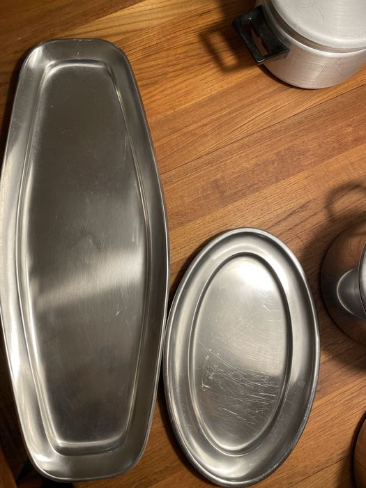 Travessas inox e tacho de pudim