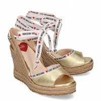 Love Moschino złote sandały espadryle koturny wstążki skóra gold