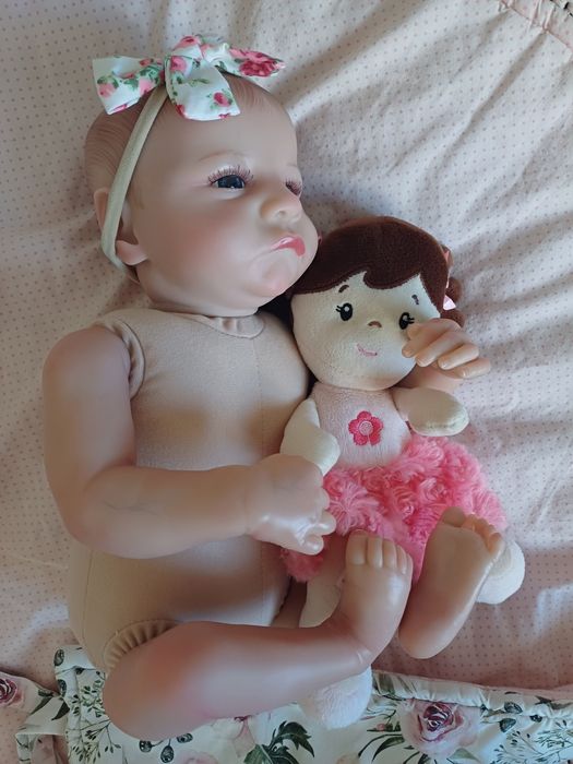 Lalka w typie reborn, drobna wada