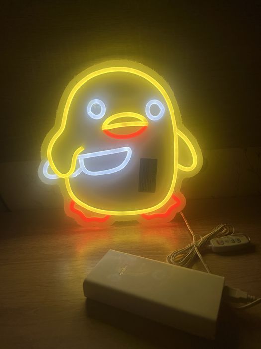 Неонова вивіска качка