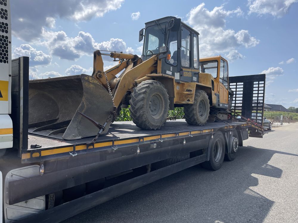 Pomoc drogowa Transport maszyn budowlanych i rolniczych laweta,holowni