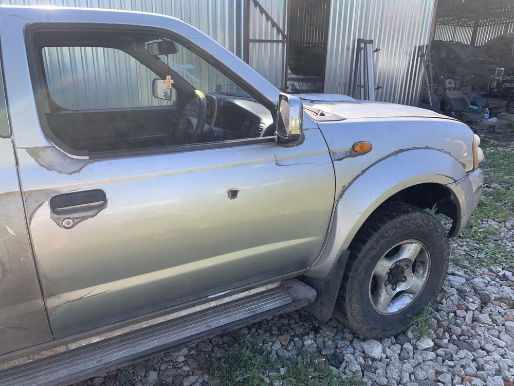 Разборка Nissan Navara D22 Kingcab запчасти мост стекло диск фара
