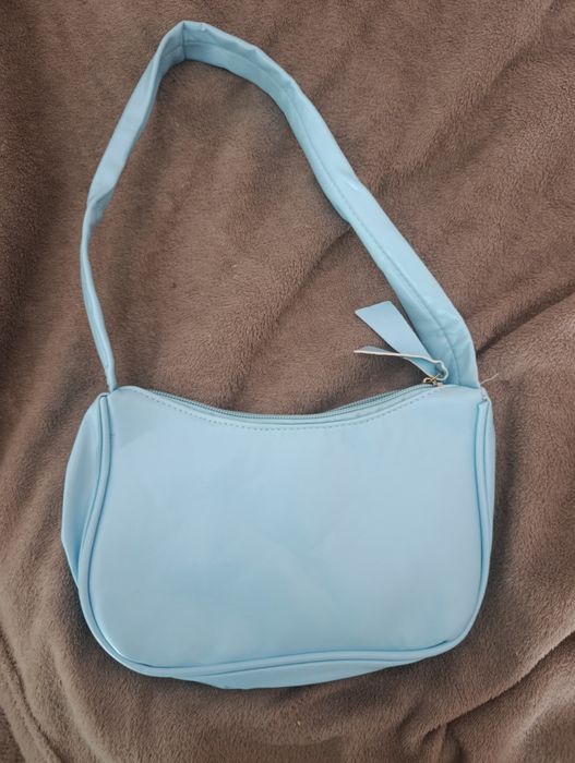 Синя маленька сумка