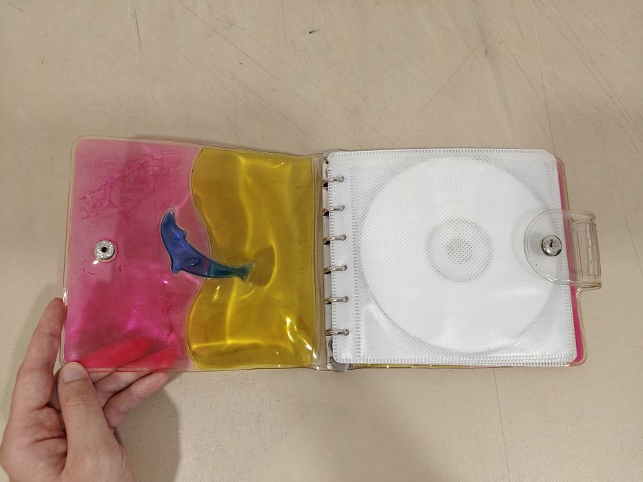 Estojo/ Porta CDs com argolas - capacidade para 24 CDs