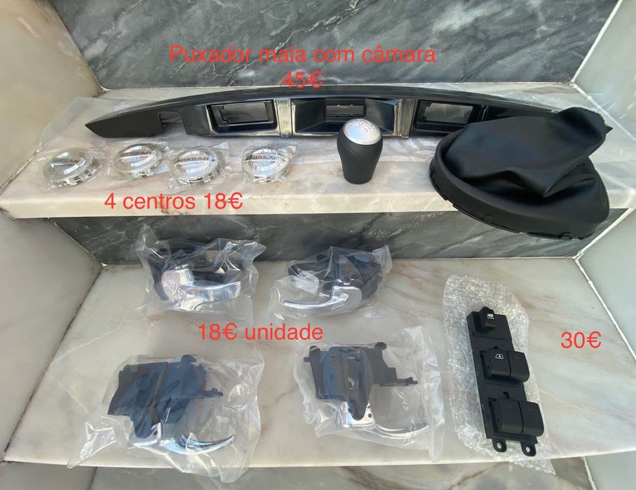 Nissan qashqai j10 puxador porta mala Manete centros comando vidro
