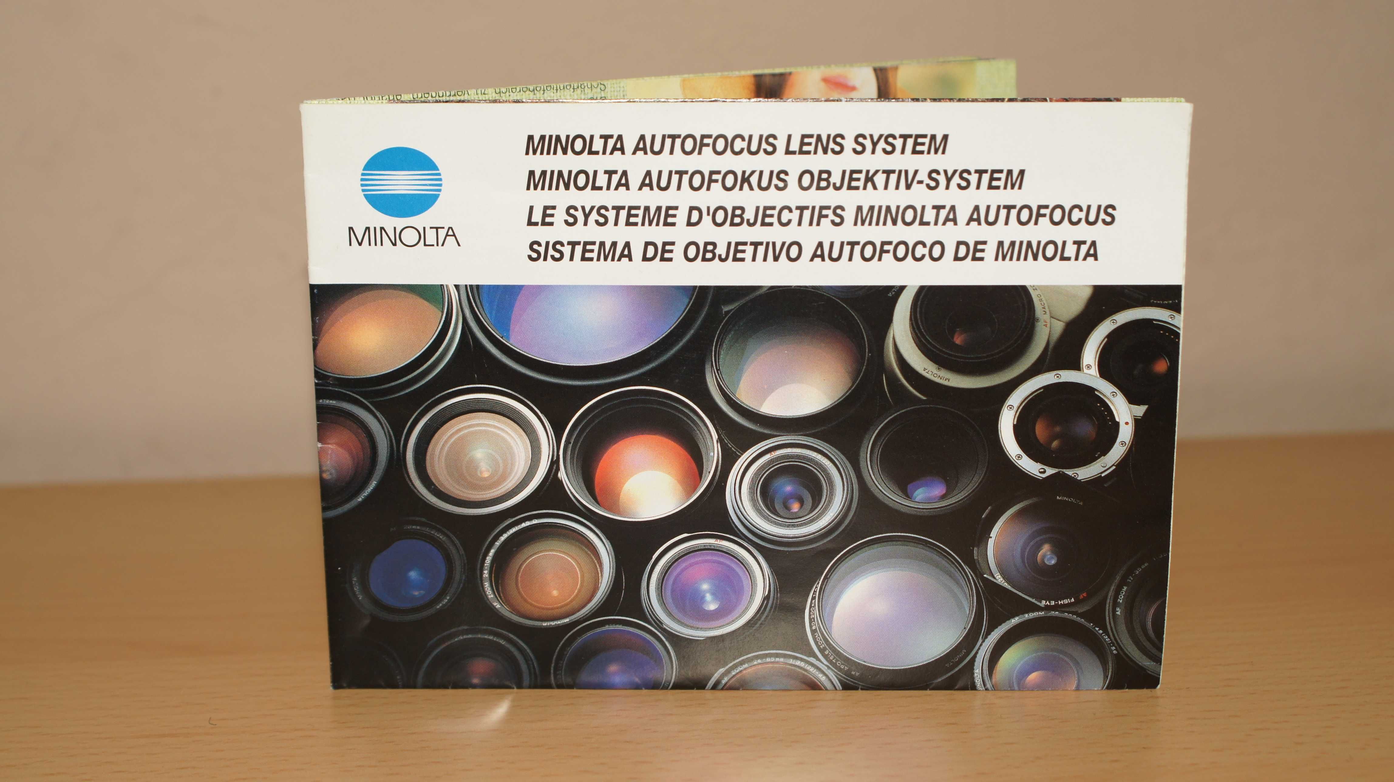Folder z obiektywami firmy Minolta