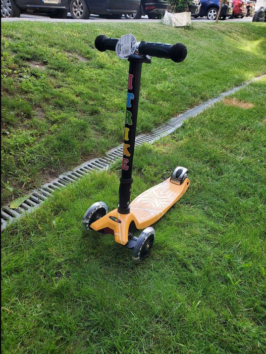 желтый самокат трехколесный детский новый