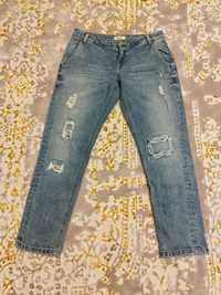 Spodnie damskie Pimkie jasnoniebieskie dżinsy z dziurami rozmiar M 38