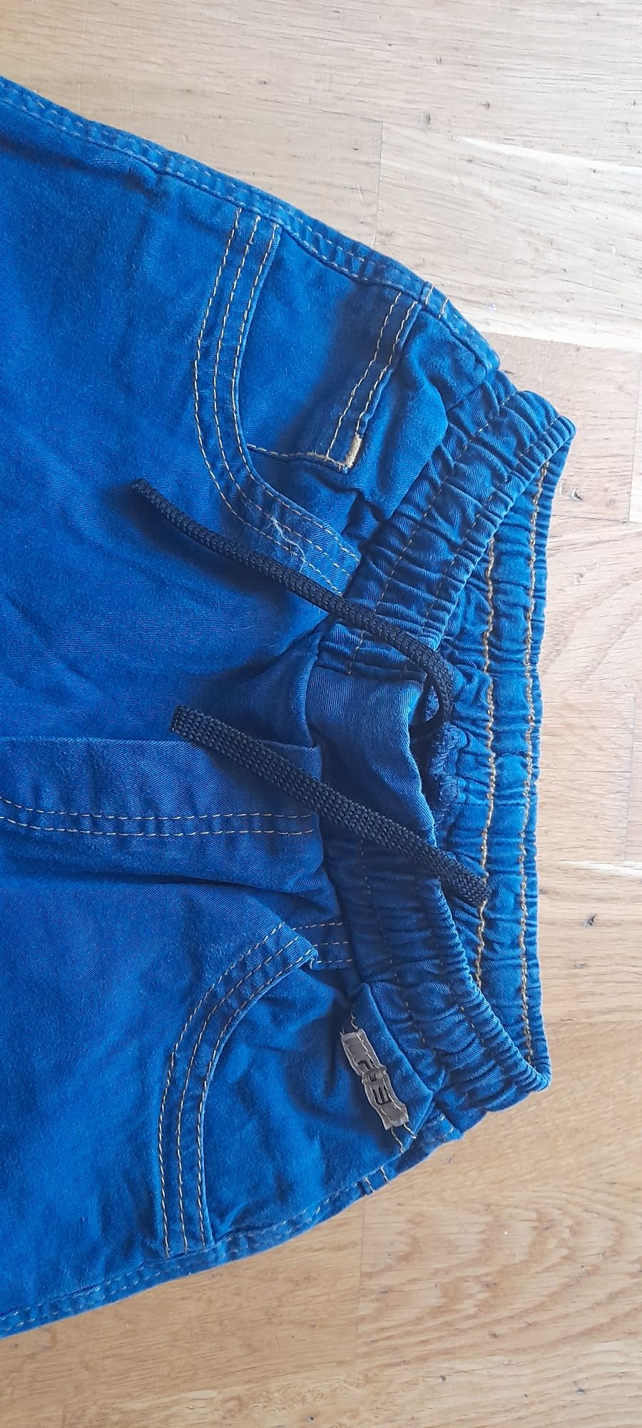 Spodnie jak nowe 134