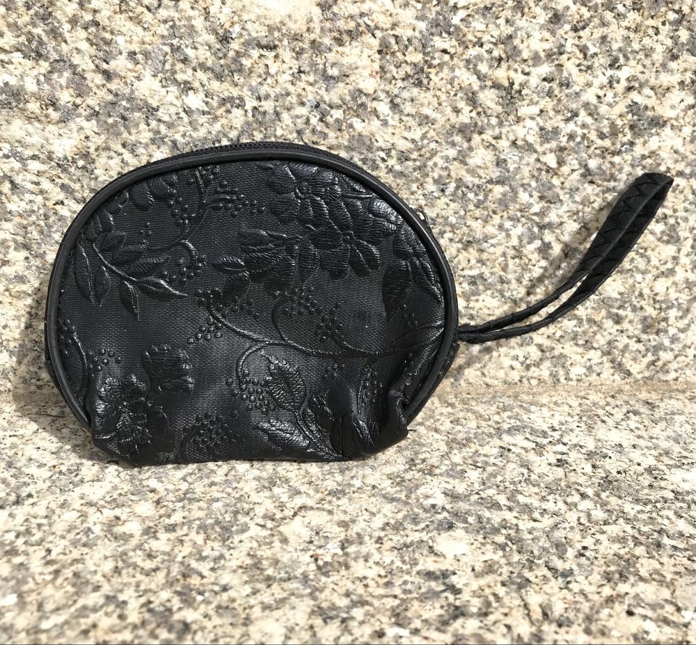 Pequena bolsa de moedas