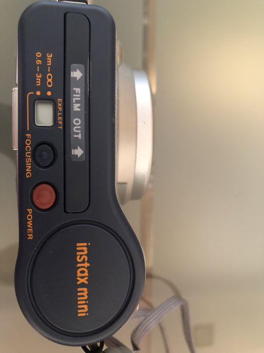 Maquina fotografica instantânea