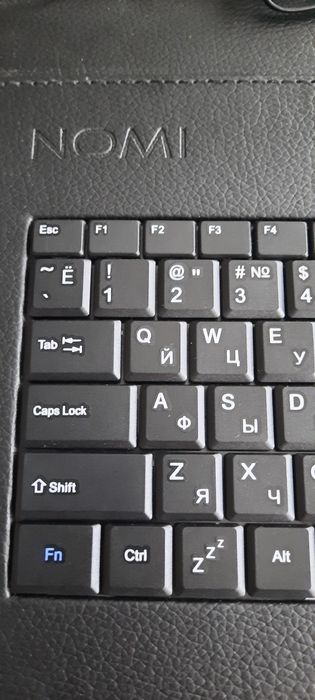 Клавіатура підставка для планшета Nomi