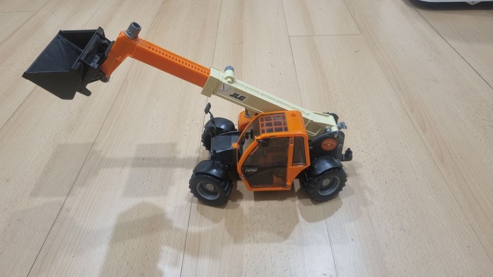 Ładowarka teleskopowa mini koparka BRUDER