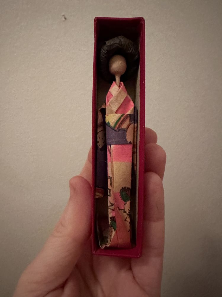 Vintage geisha origami doll