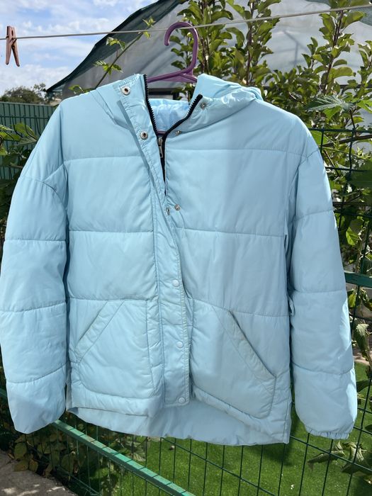 Блакитна жіноча куртка