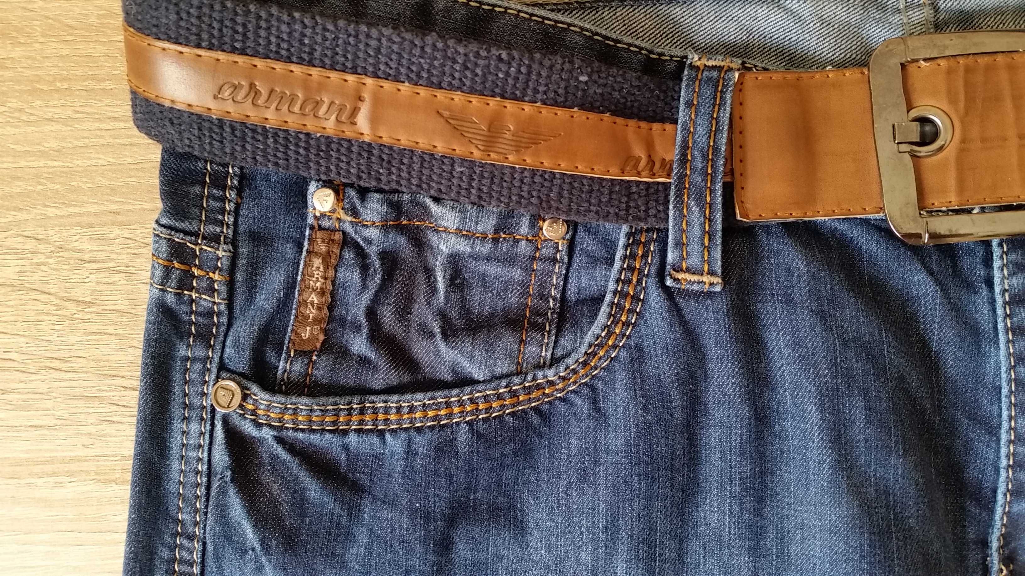 Nowe spodnie dżinsowe Armani z paskiem