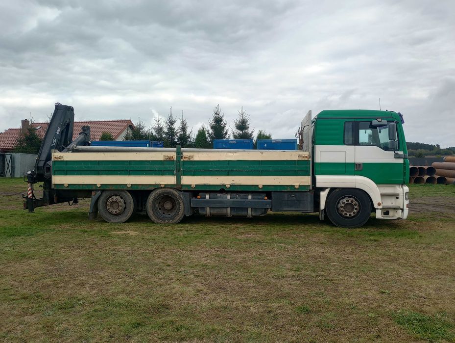 Ciężarówka MAN TGA trzyosiowy z osią podnoszoną