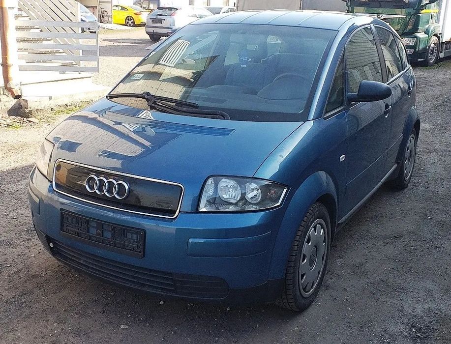 Na części Audi A2 1.4 benzyna lak. LZ5H silnik AUA skrzynia FCU maska błotnik drzwi szyba klapa zderzak lampa grill fotele kanapa deska