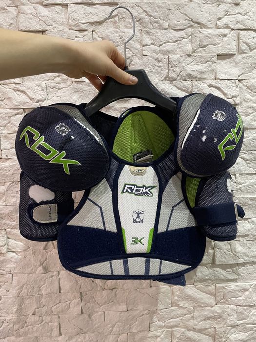 Нагрудник хоккей reebok 120-145см