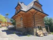 Stylowy drewniany dom regionalny w Kościelisku z widokiem na Tatry
