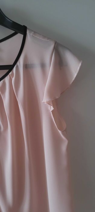 Blusa completamente nova