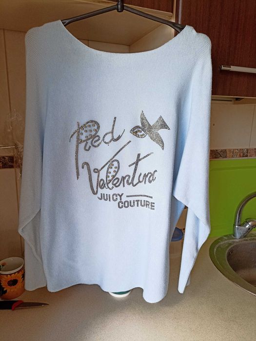 Женский тонкий свитер нежно-голубого цвета 50 розмера.