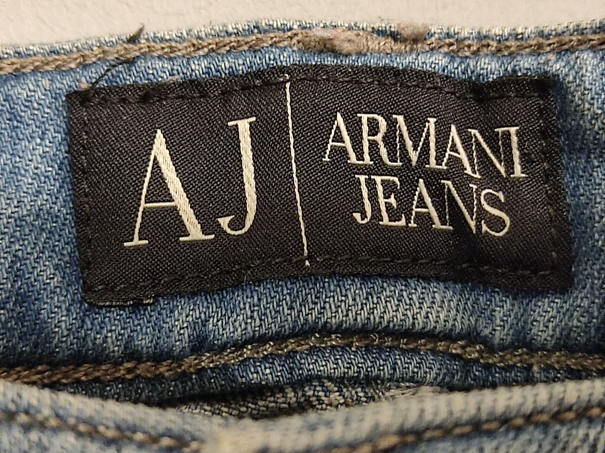 Armani Jeans spodnie jeansowe dziury zamki r.38