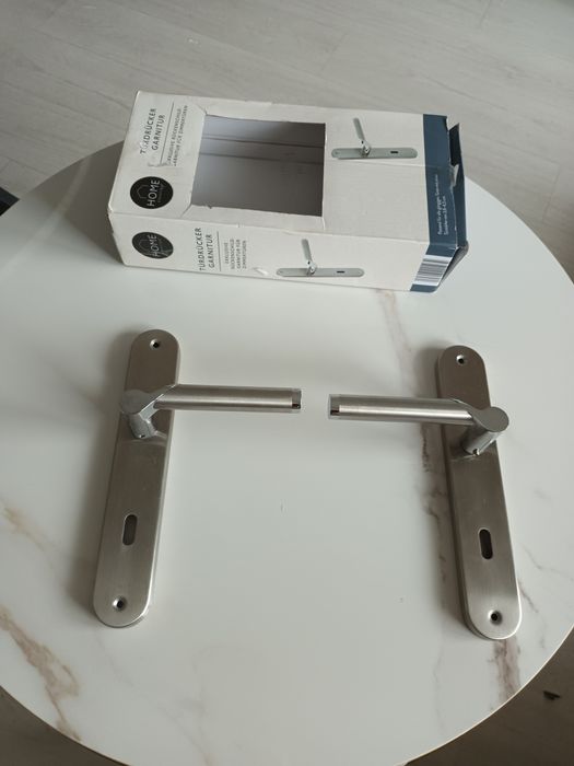 Nowe  klamki do drzwi wewnetrzych