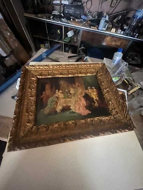 Pintura antiga com moldura dourada