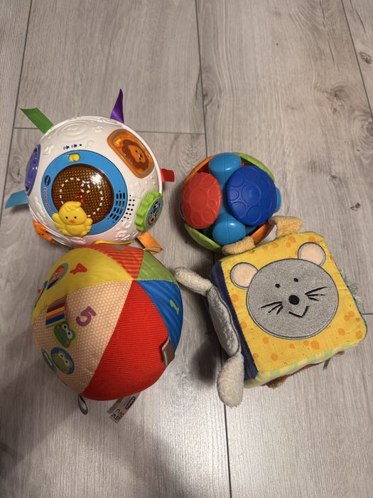 Zabawki niemowlęce interaktywne vtech oball chicco ravensburger