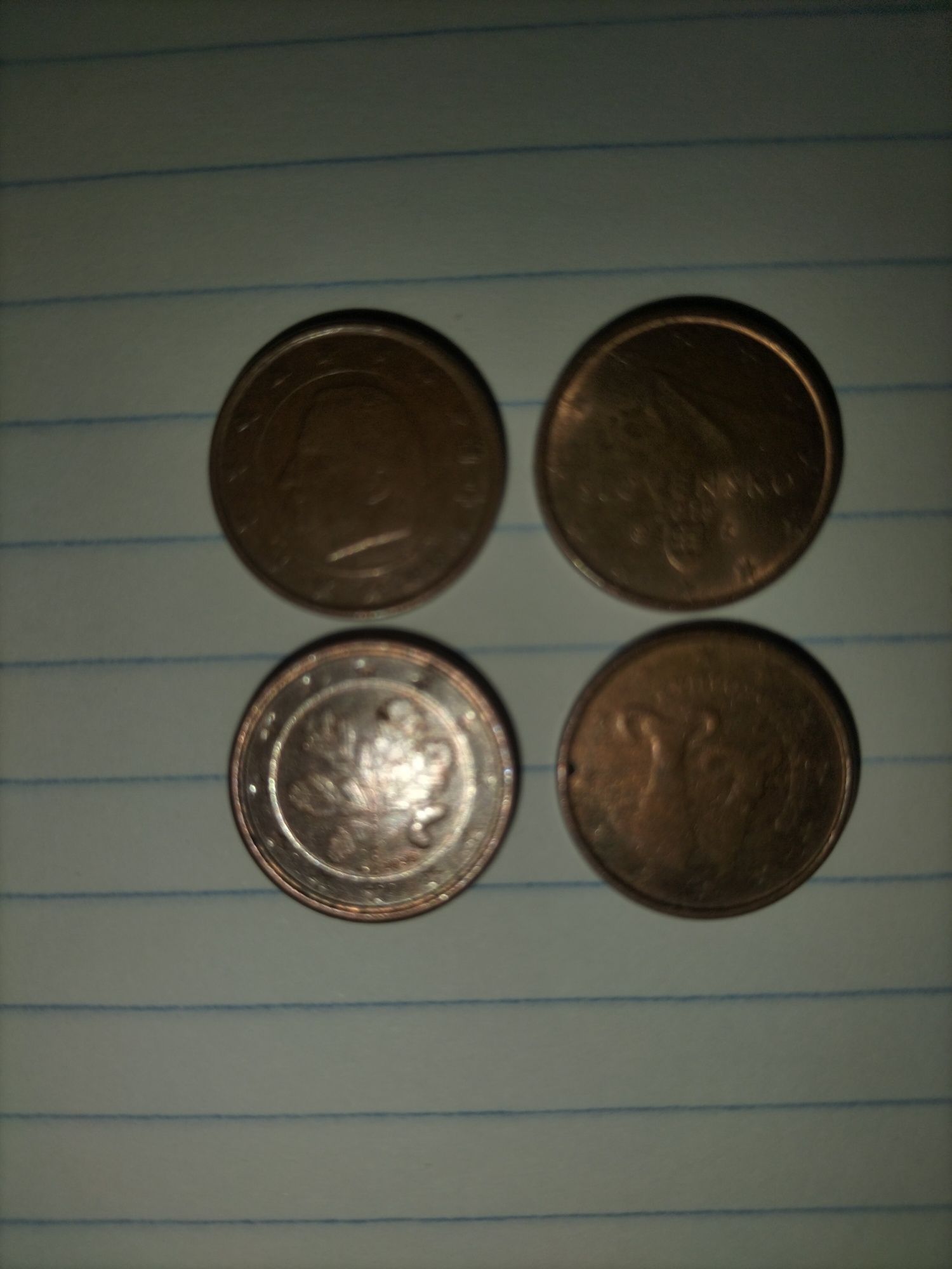 Moedas de 5, 2 e 1 cêntimo.
