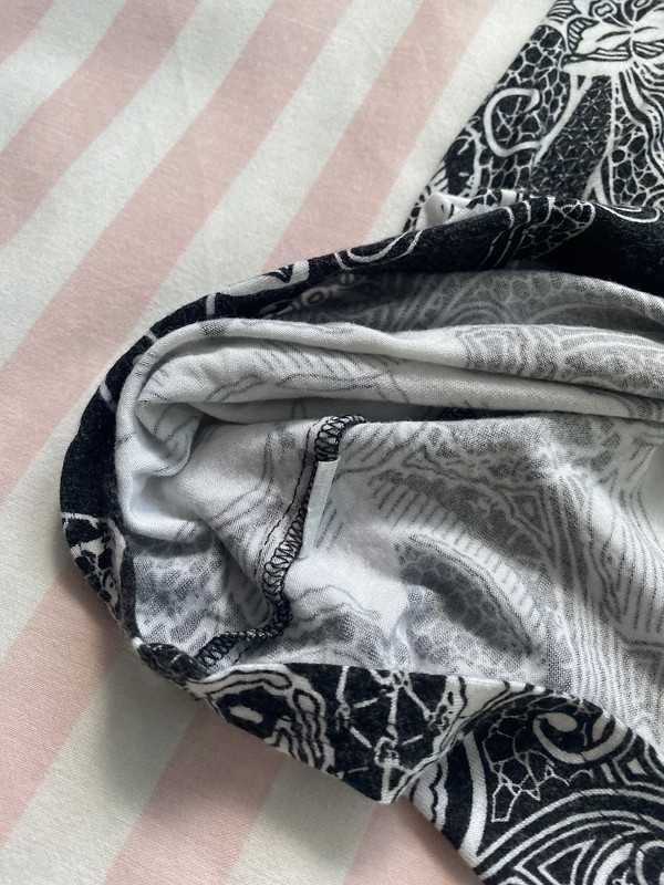 Czarna bluzka na ramiączkach w kwiaty Rexiger M-XL 38/40/42