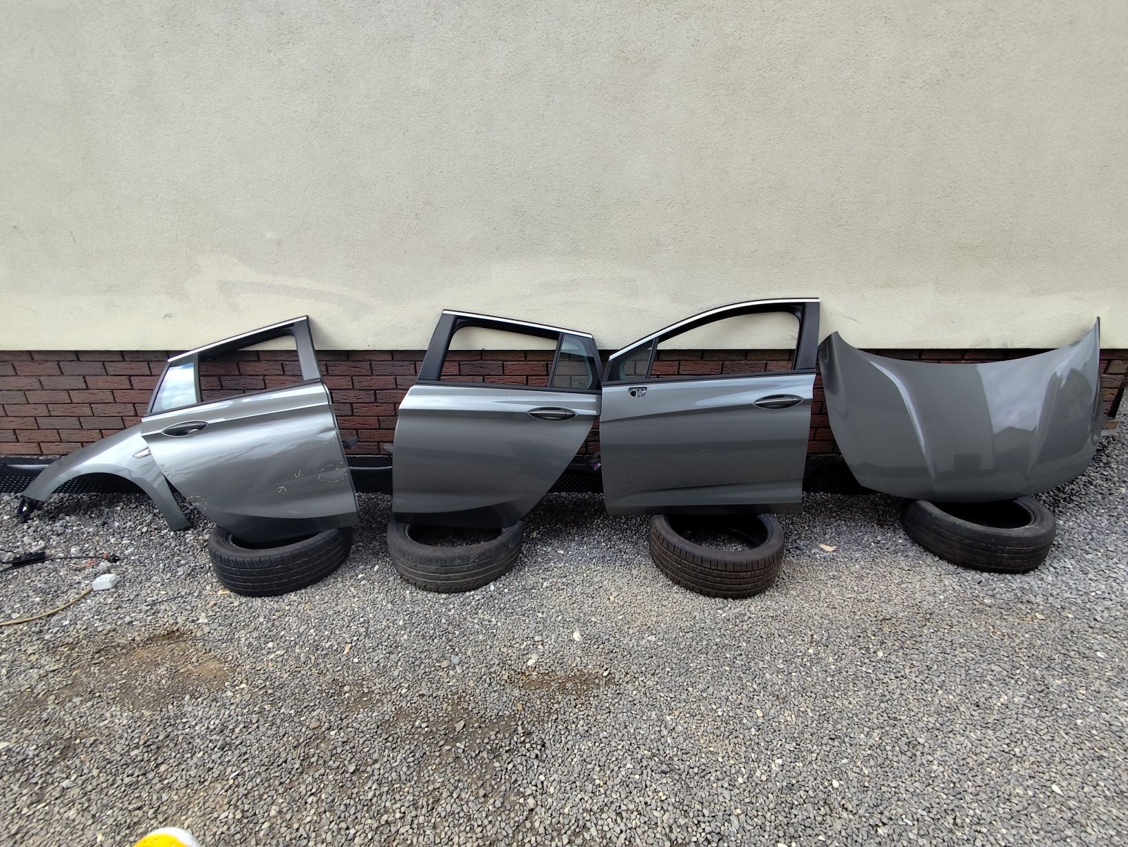 Drzwi lewy przód tył przednie tylne opel astra k kombi z10a